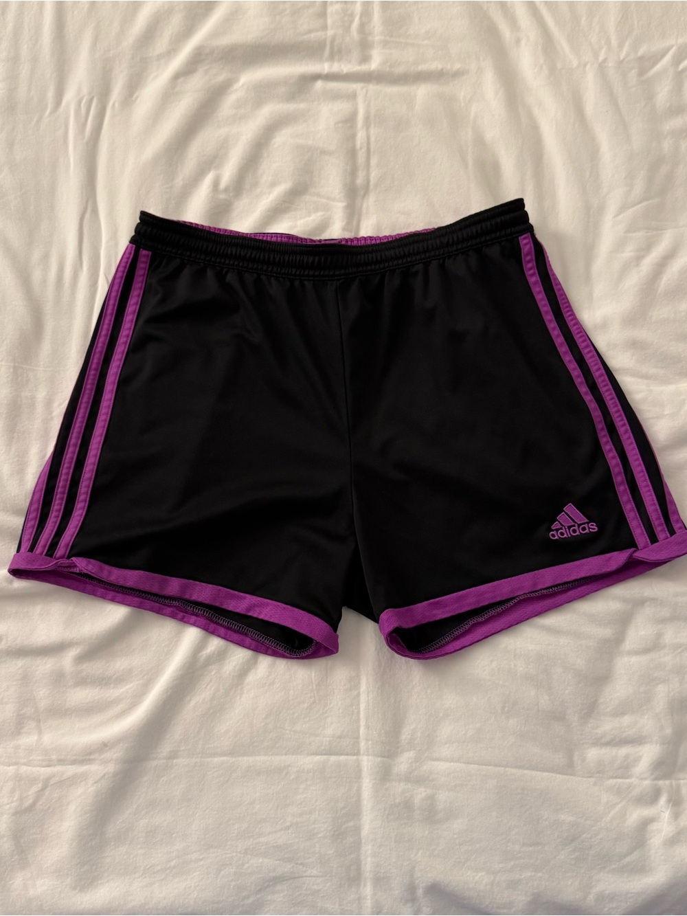 Adidas black shorts with purple stripes, size Small